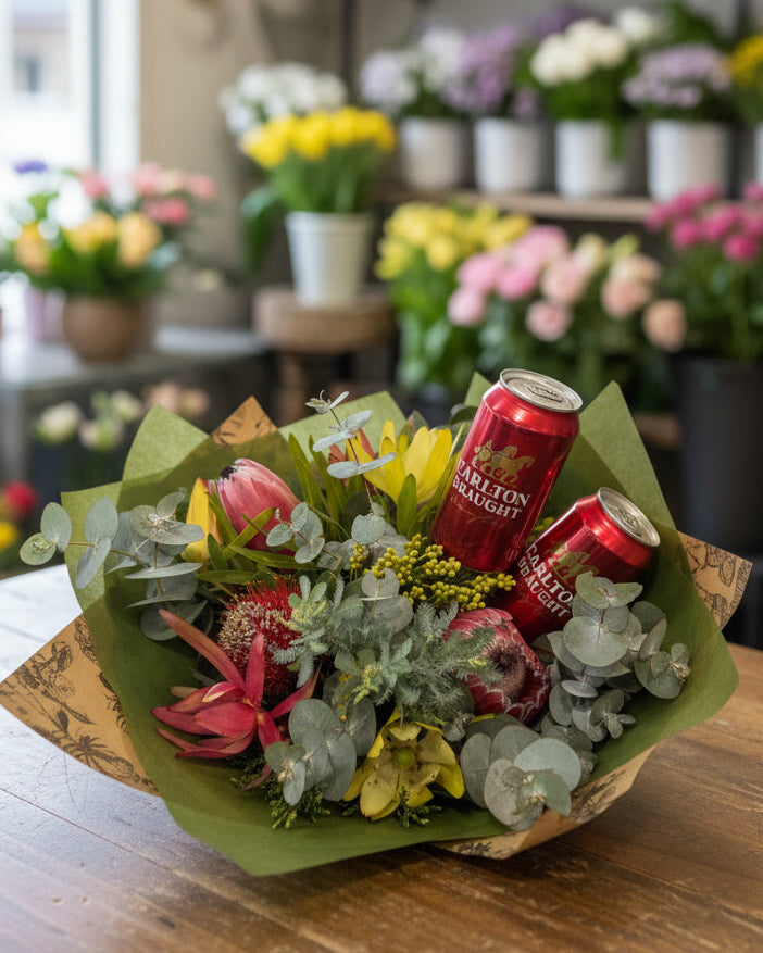 Bouquet of flowers with two cans of Carlton Draught beer
